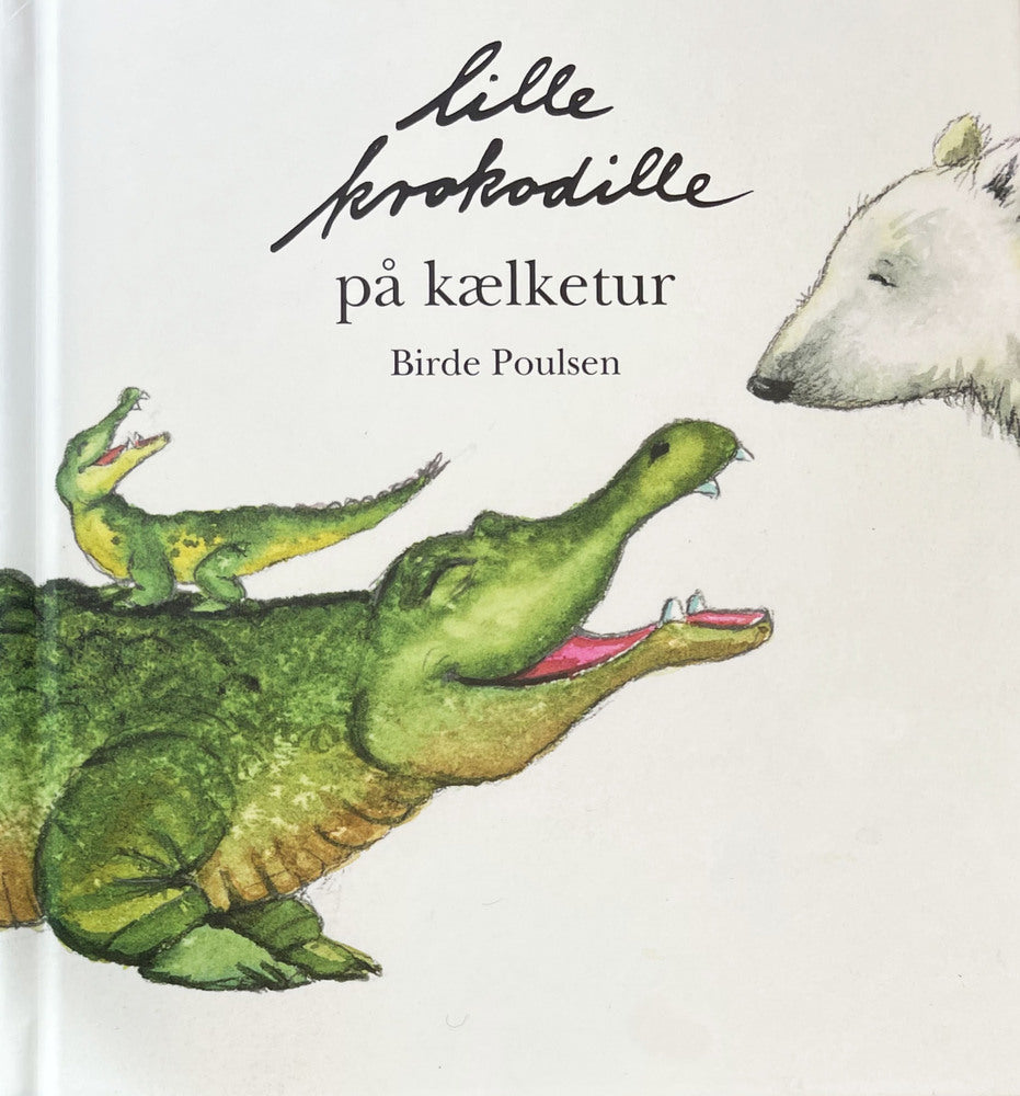 Lille krokodille på kælketur